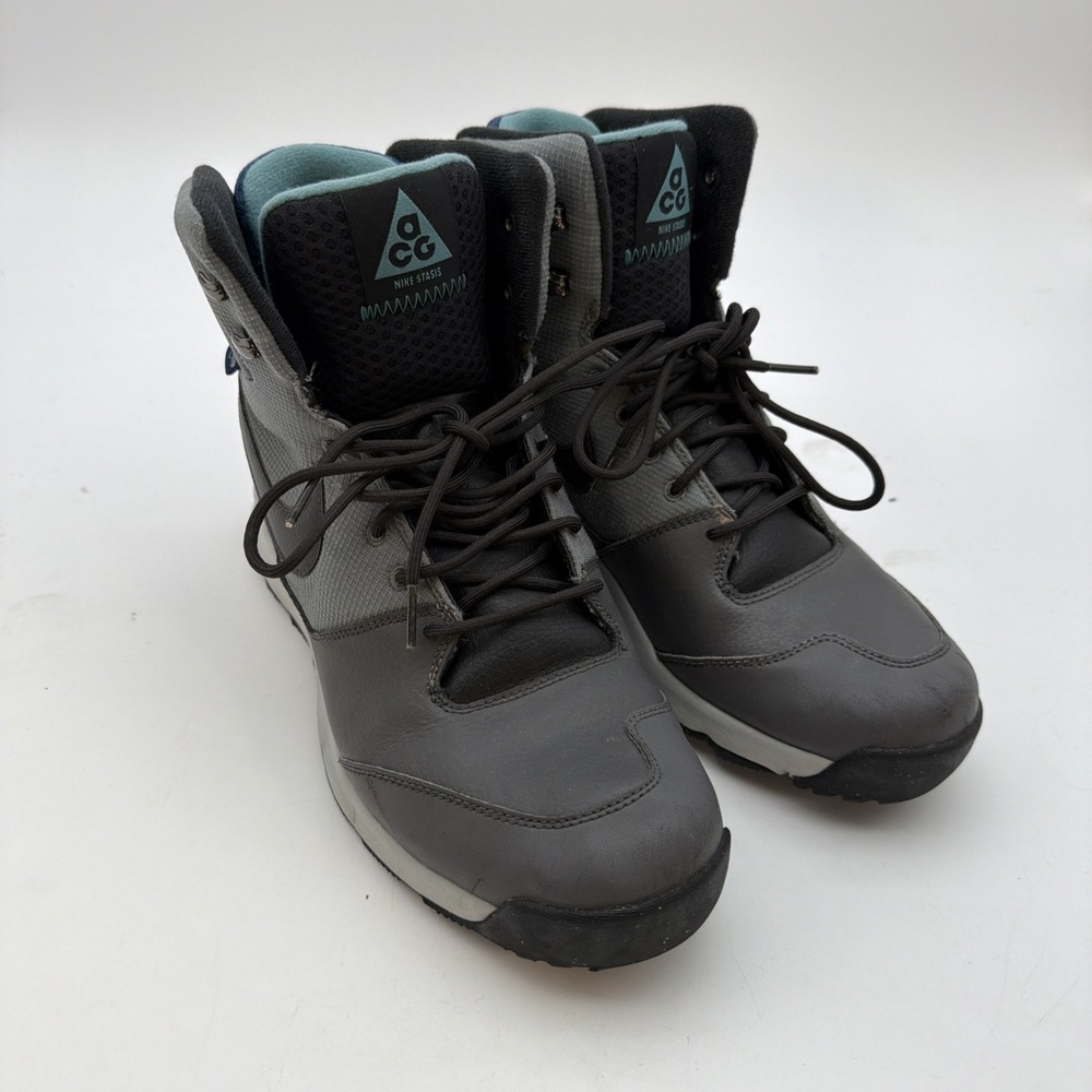 Nike Stasis ACG boots, featuring a dark grey upper with teal Accent Size 9